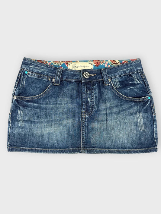 Denim mini skirt in dark blue with floral lining front view.