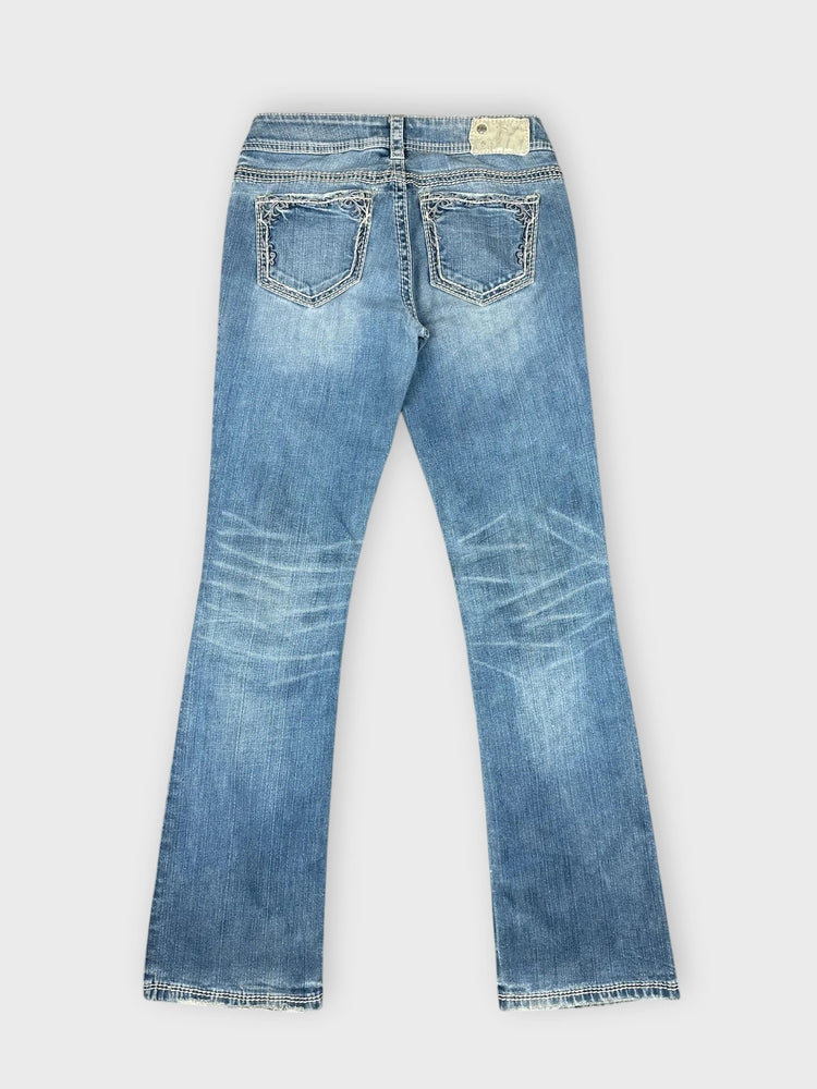 Distressed Light Blue Flare Jeans with Edgy Rips (W27 / S)
