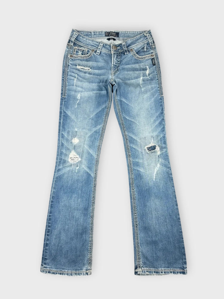Distressed Light Blue Flare Jeans with Edgy Rips (W27 / S)