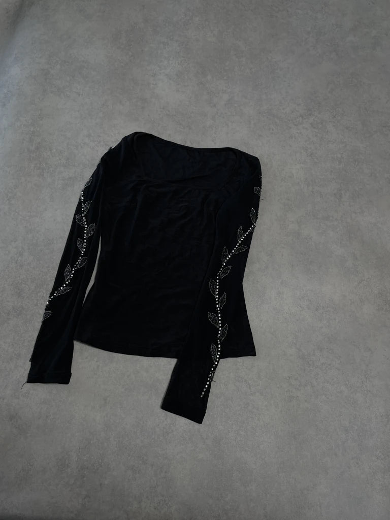 top with gems decoration on the sleeves