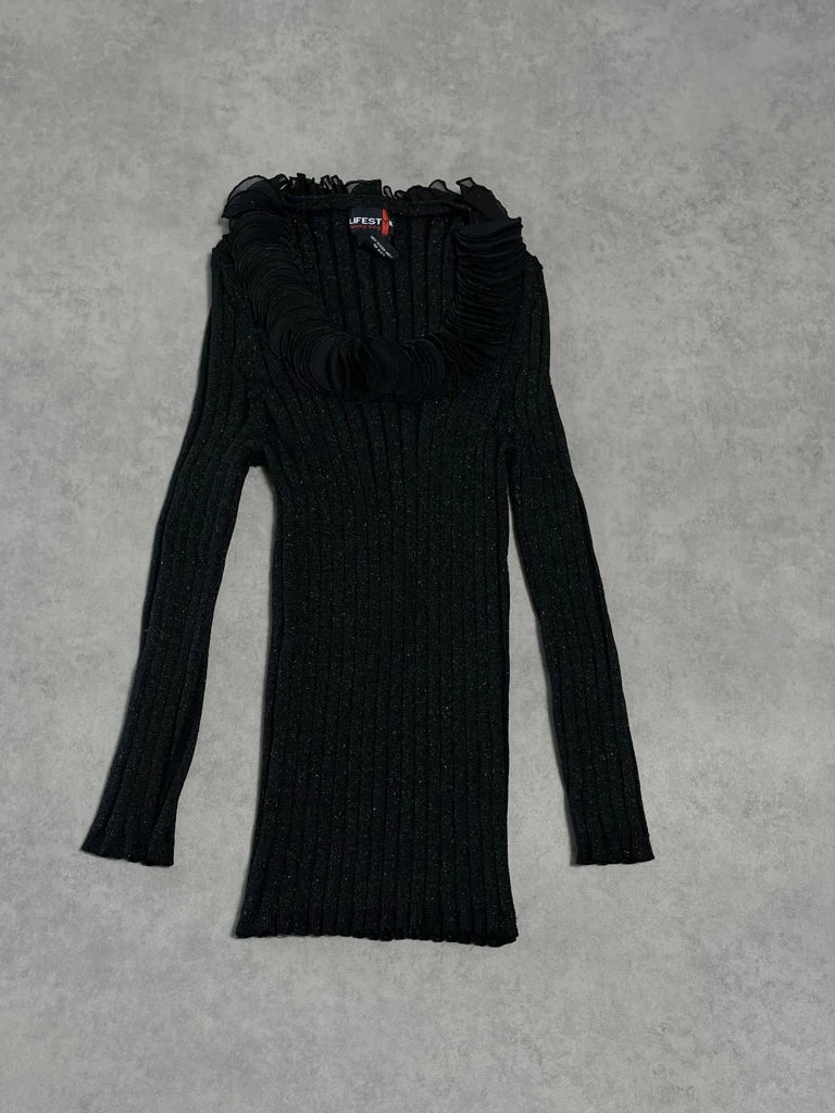 black jumper with decorated neck