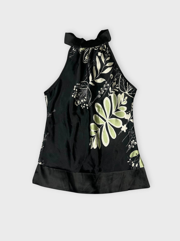 Elegant floral satin halter top in black with green floral print front view