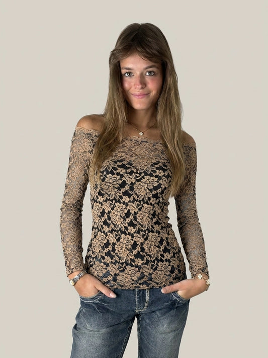 Front view of a black and beige floral lace bardot top.