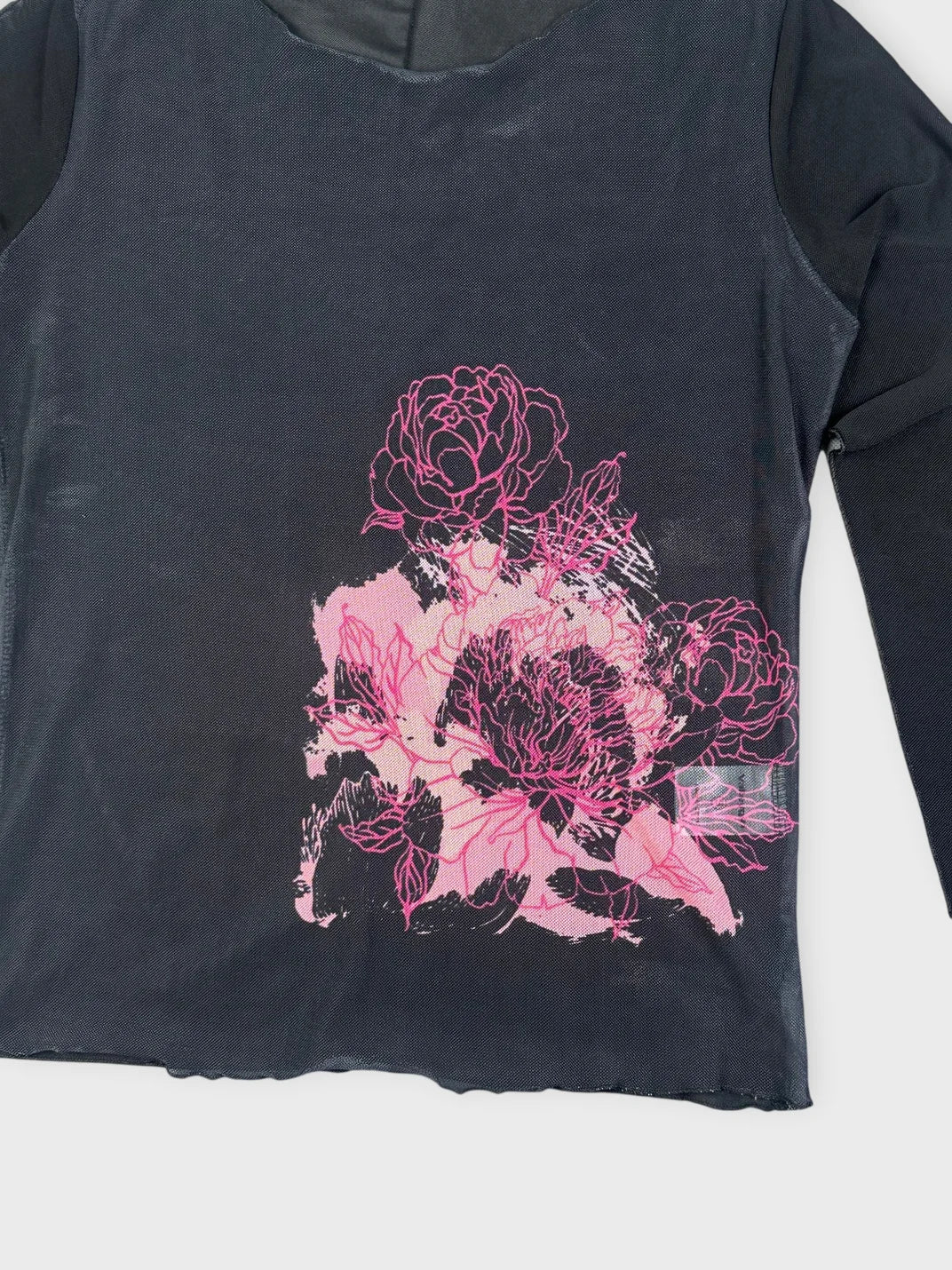 Floral layered top in black with pink floral detail view