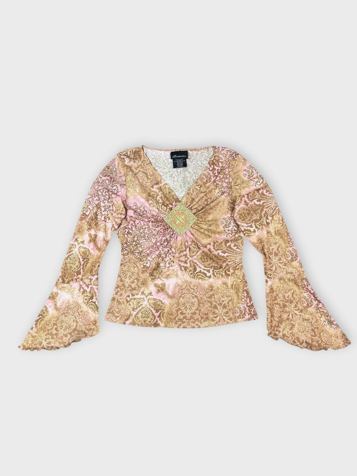Floral long sleeve top in pink and gold, front view with lace detail.