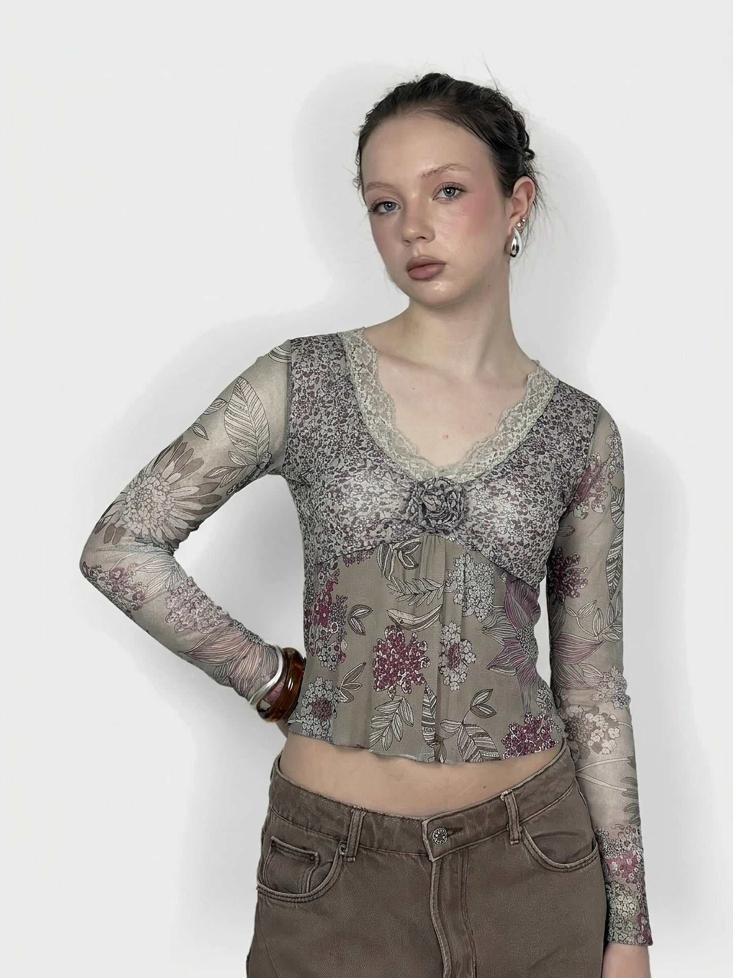 Floral mesh long sleeve top in beige with lace detail, front view.
