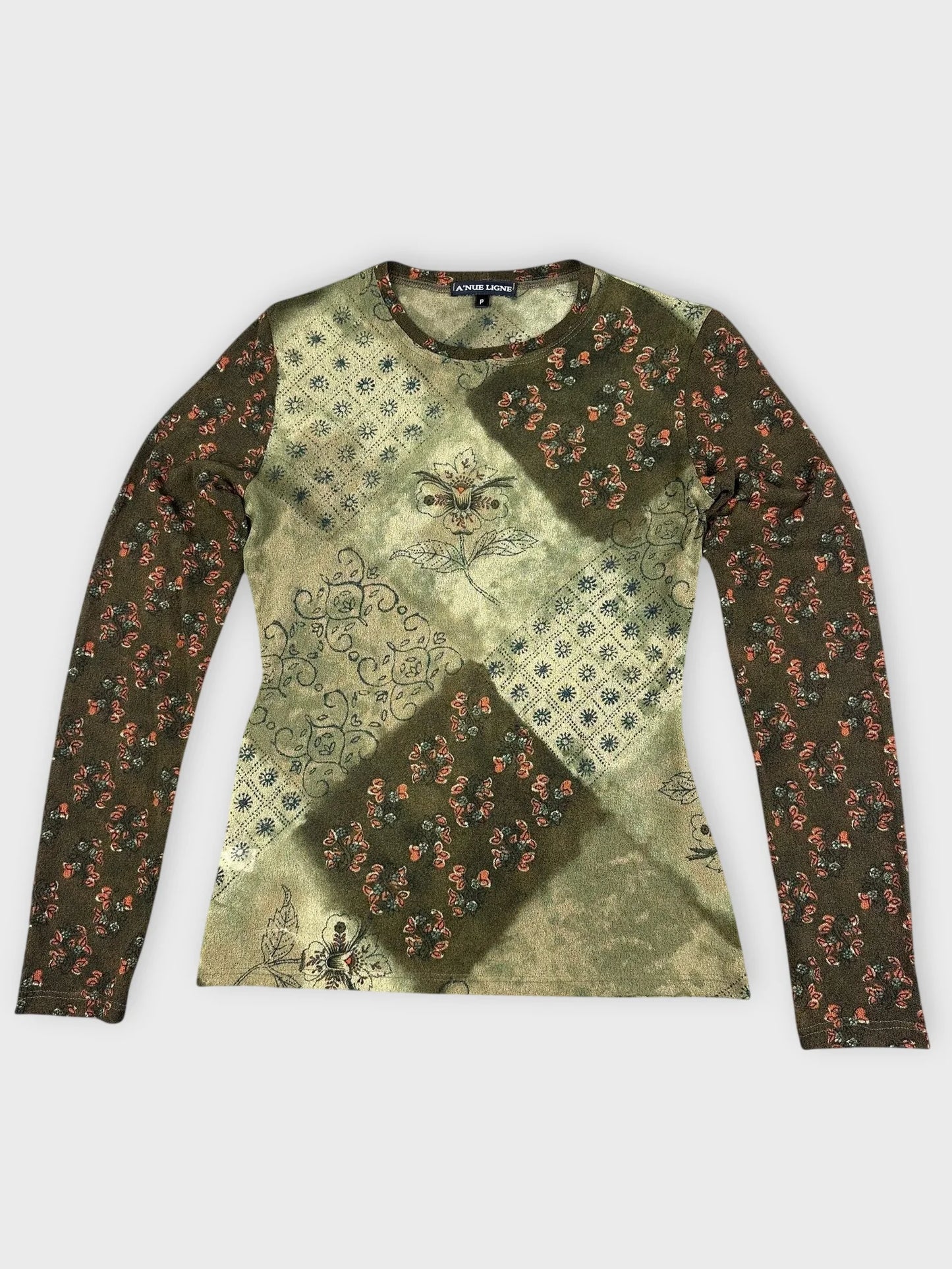 Floral patchwork long sleeve top in green detail view