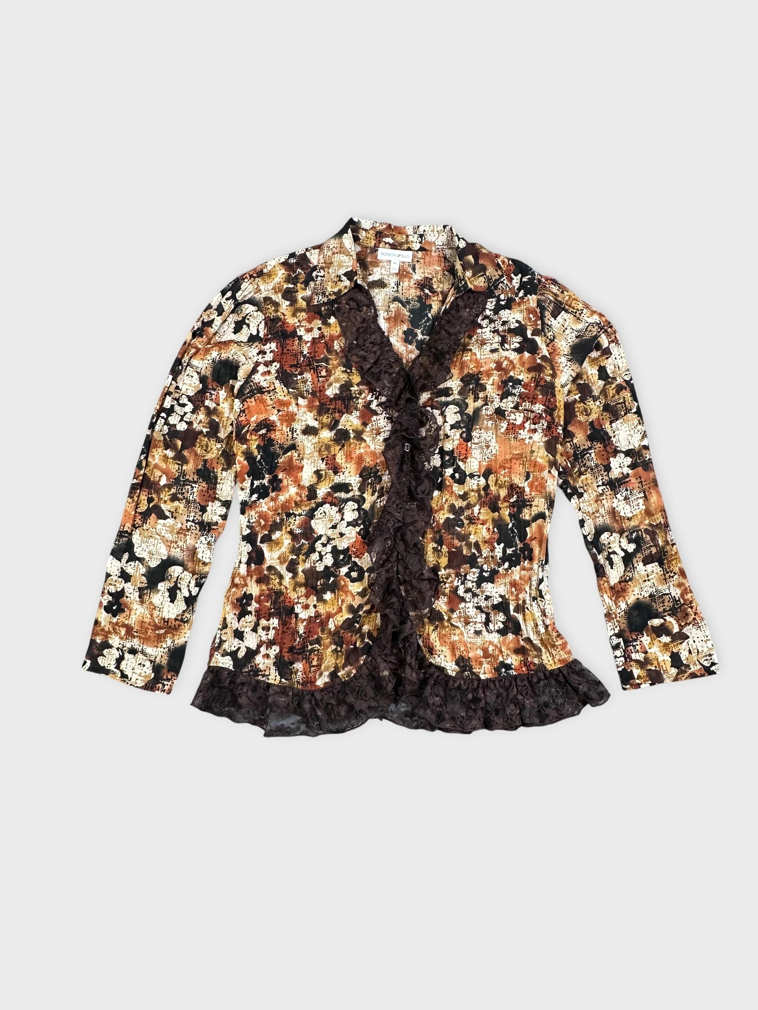 Floral-patterned blazer in brown with ruffled trim front view