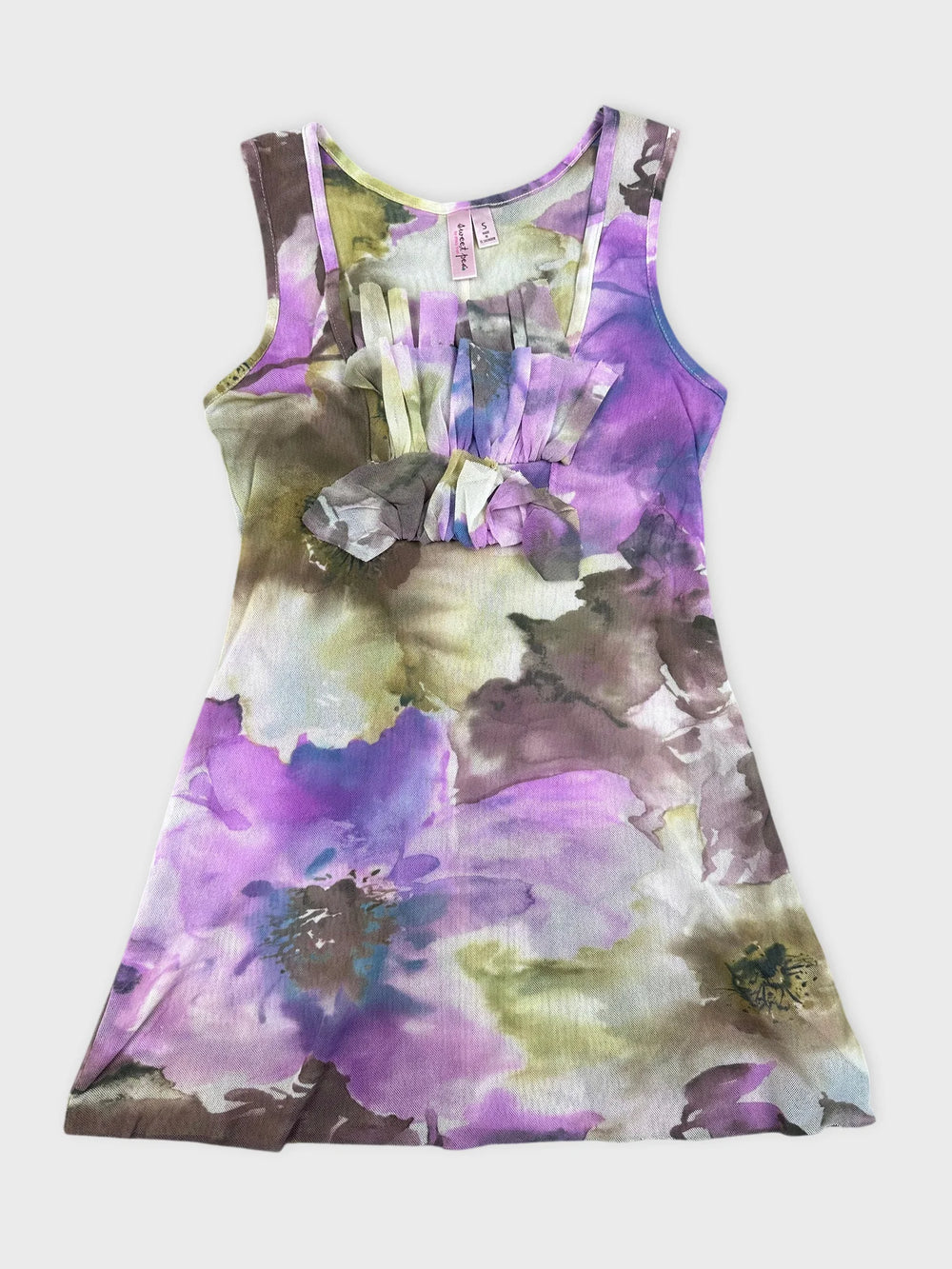 Floral print sleeveless dress in lavender hues with ruffled detail front view