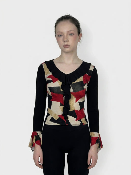 Front view of a graphic print body shirt in black, featuring red and gold pattern and flare sleeves.