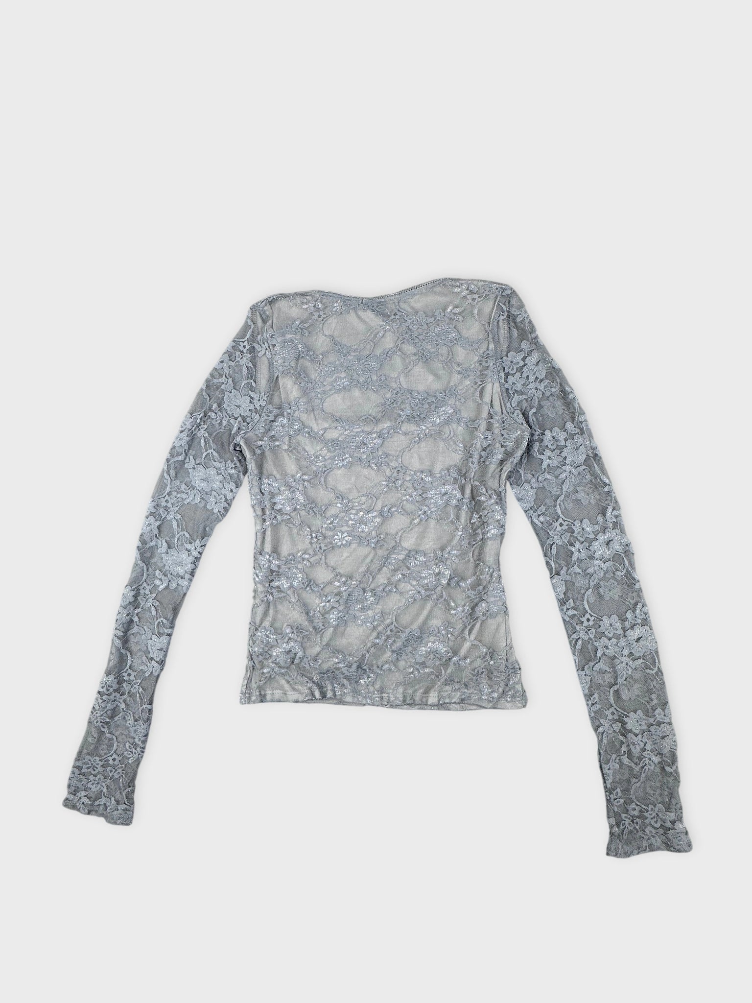 Back view of a gray long-sleeve top with floral lace pattern.