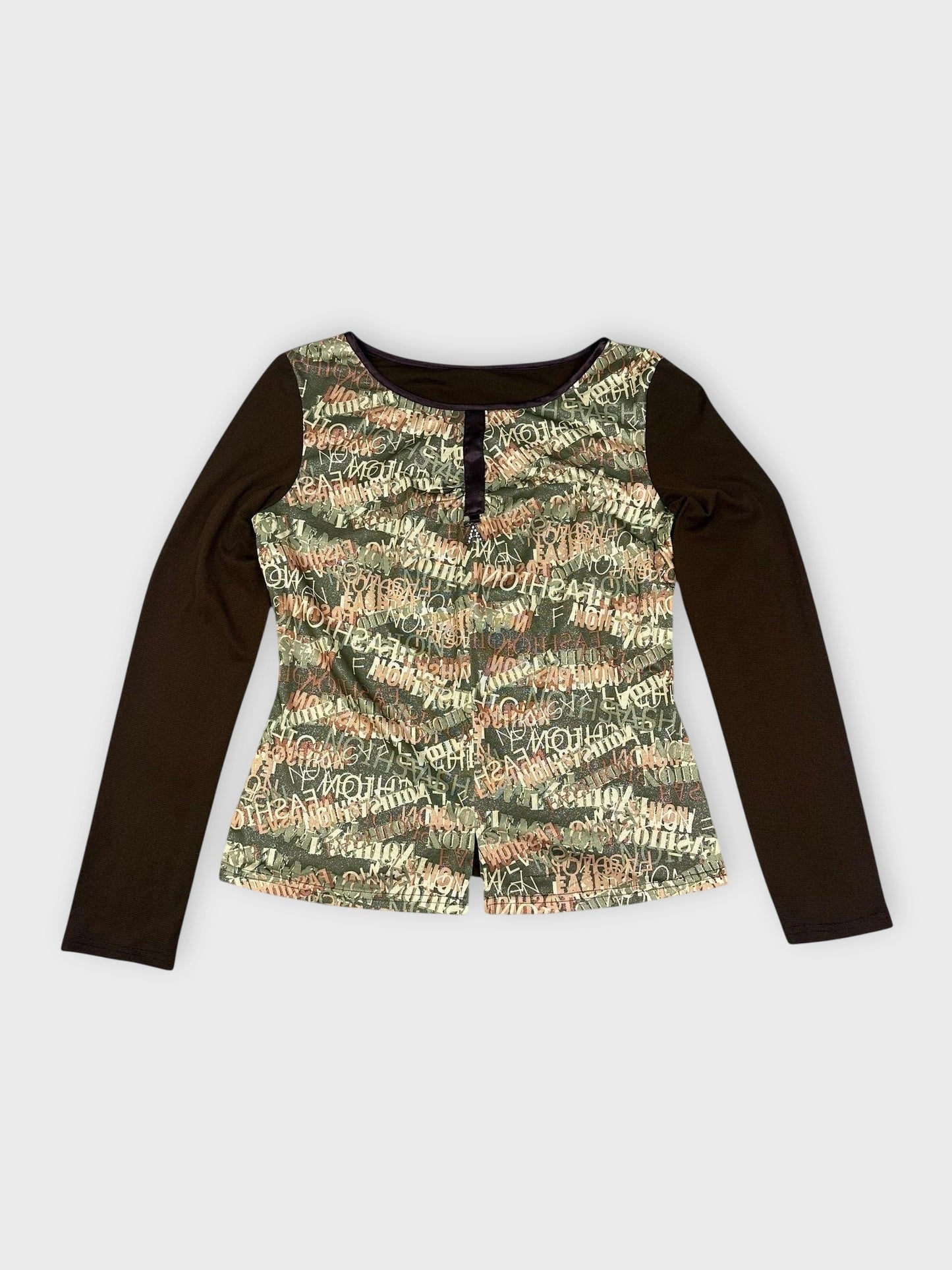 Grunge longsleeve top in khaki green front view with beige text print and brown sleeves.
