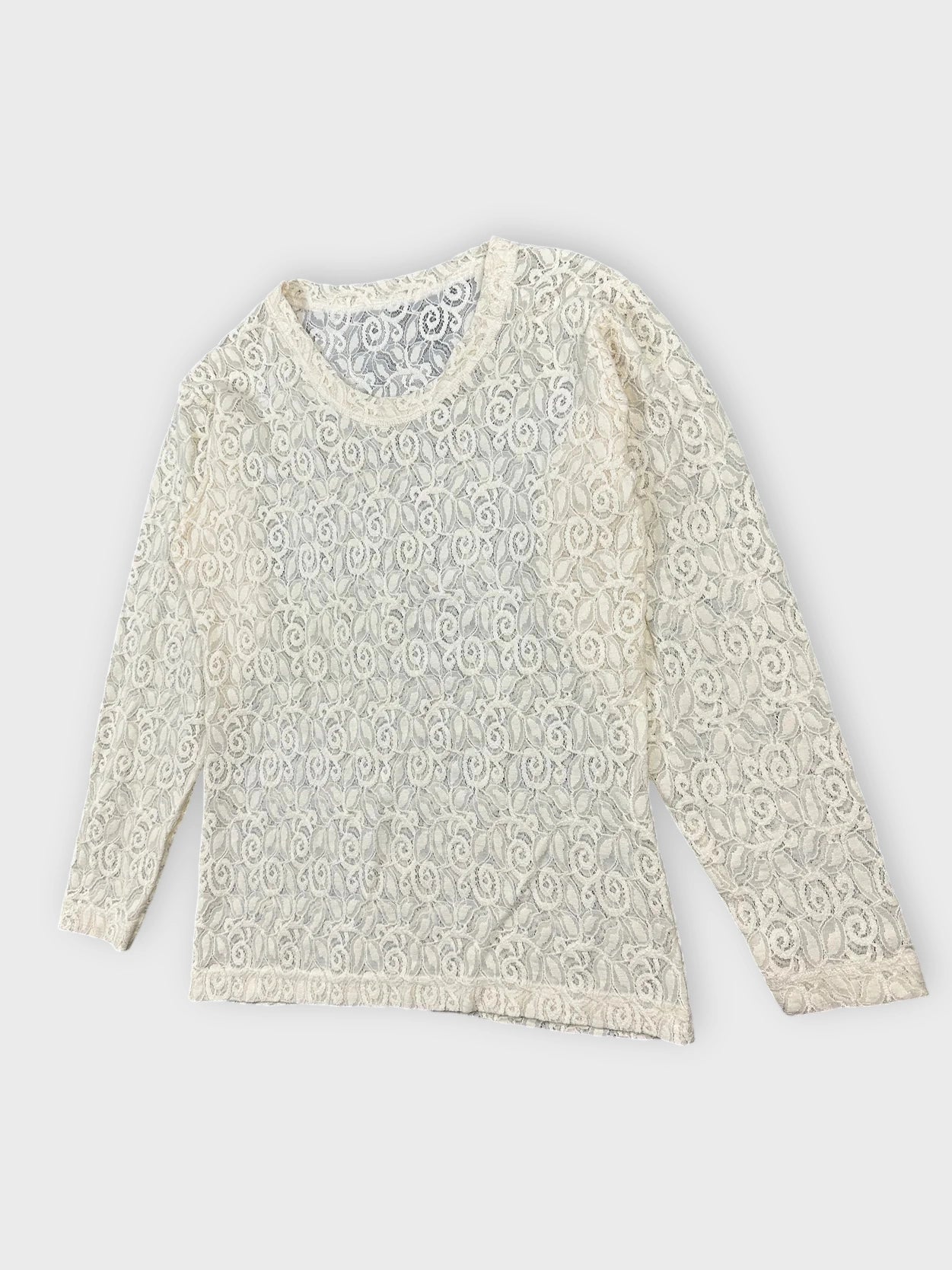 Lace long sleeve top in cream with floral pattern detail view