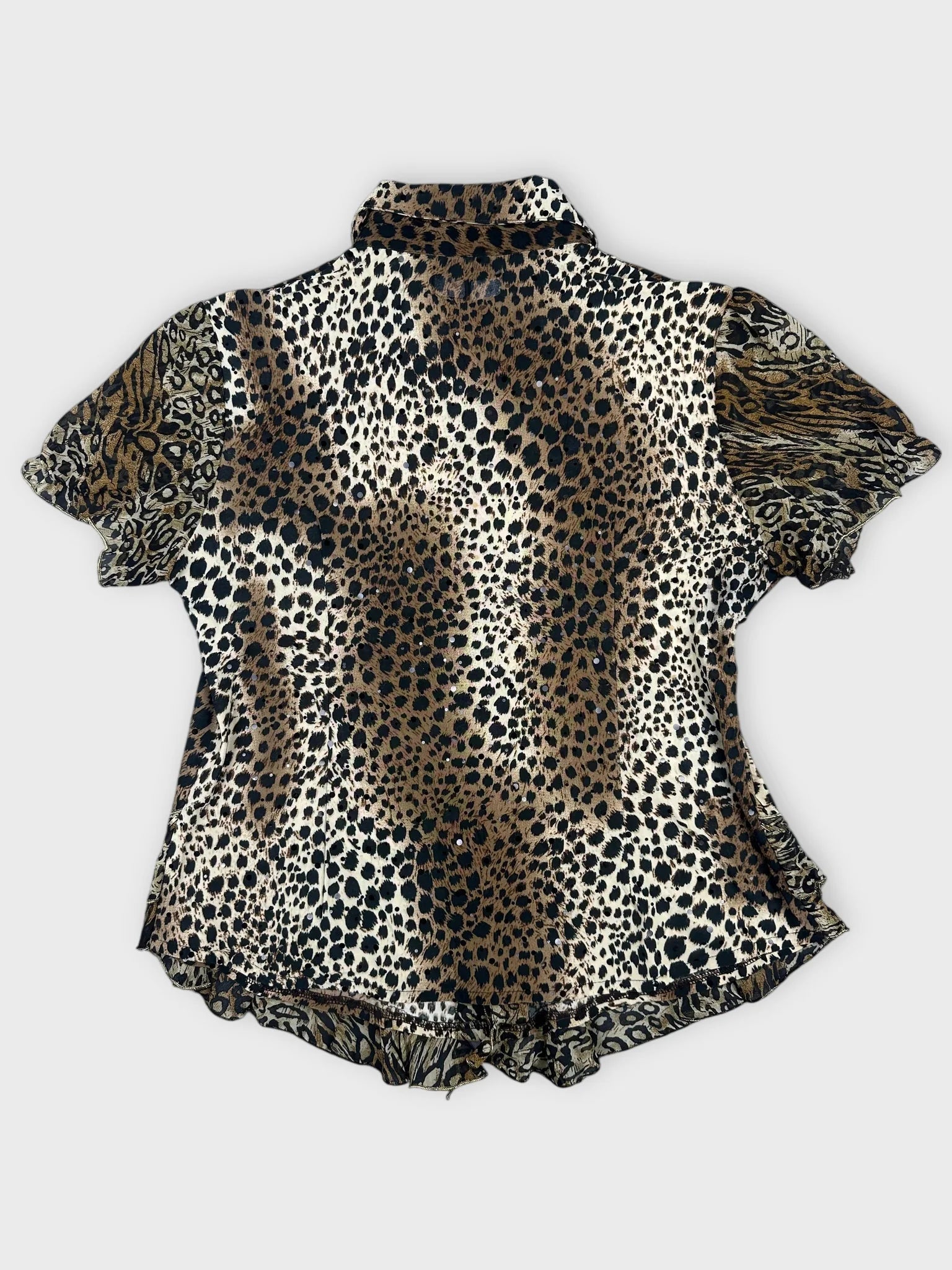 Back view of a leopard print button-up top with ruffled sleeves.