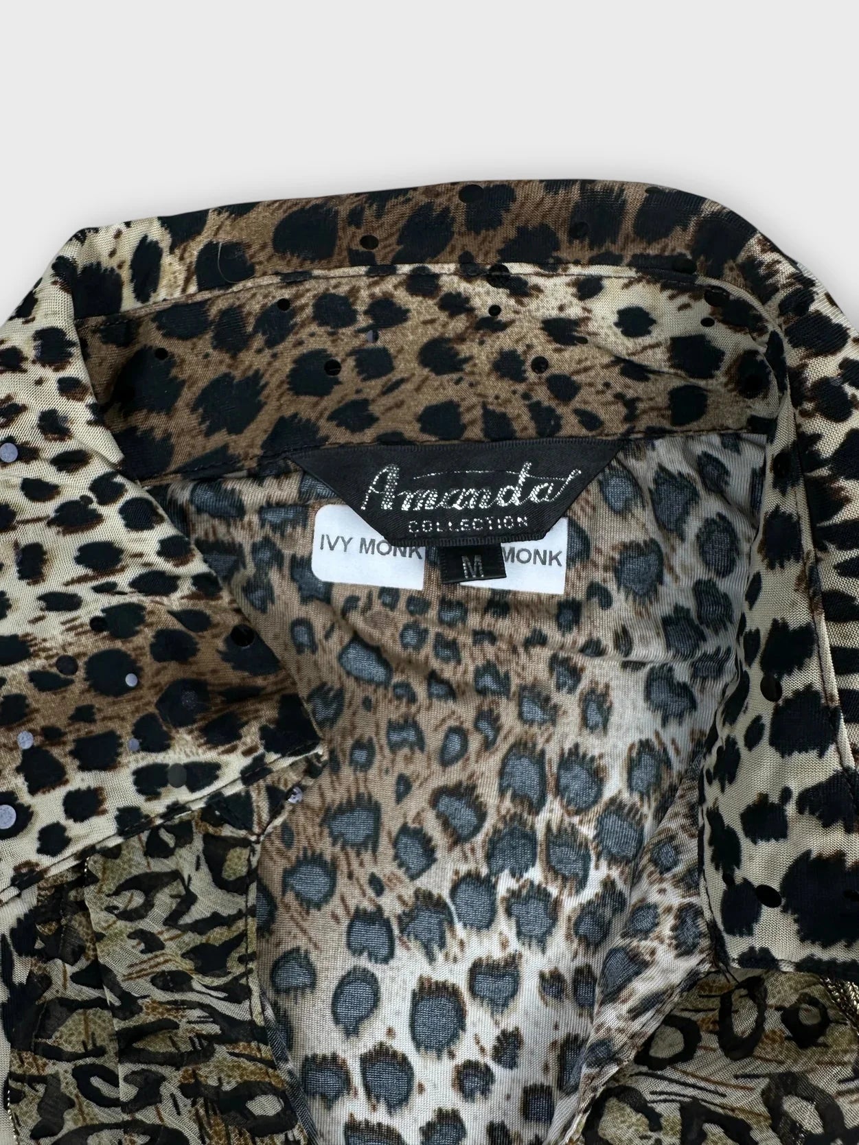 Leopard print button-up top with ruffles detail view