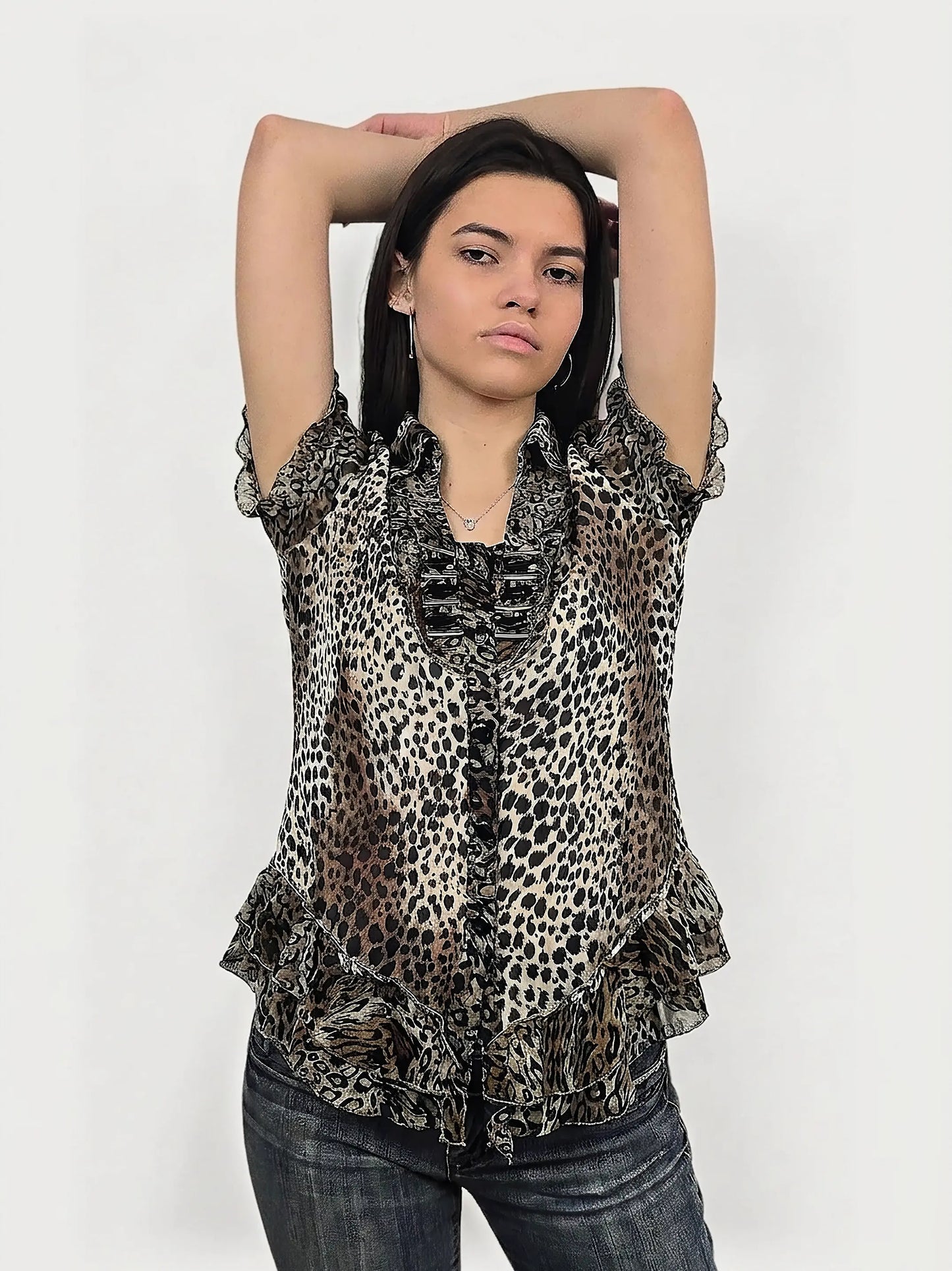 Leopard print button-up top with ruffles, front view.