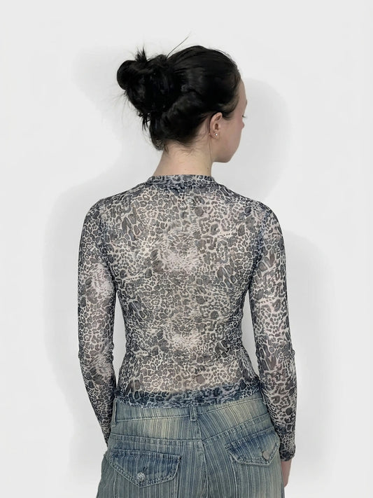 Back view of a leopard print mesh top with long sleeves.