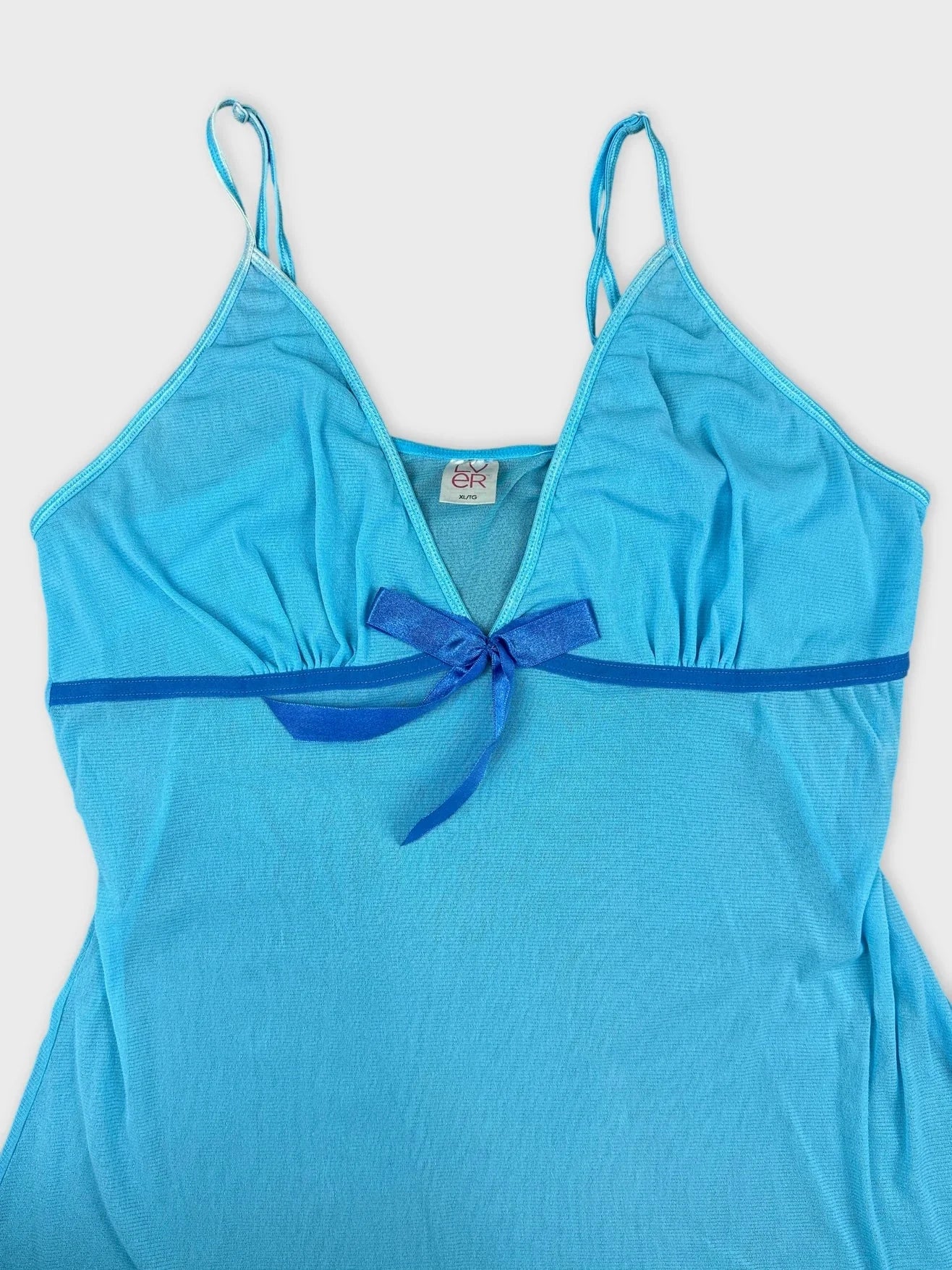Ocean blue camisole with bow detail in detail view
