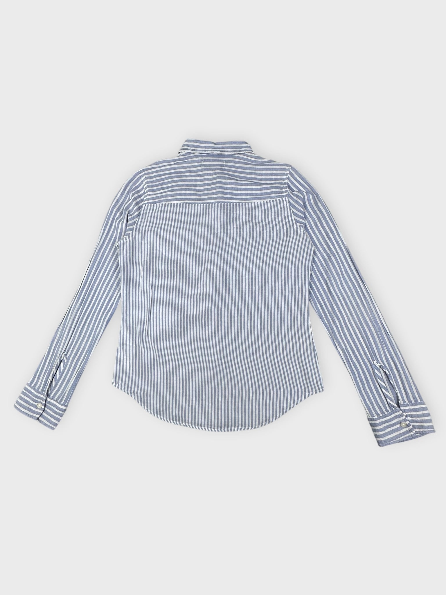 Back view of a blue and white striped button shirt with a classic collar.