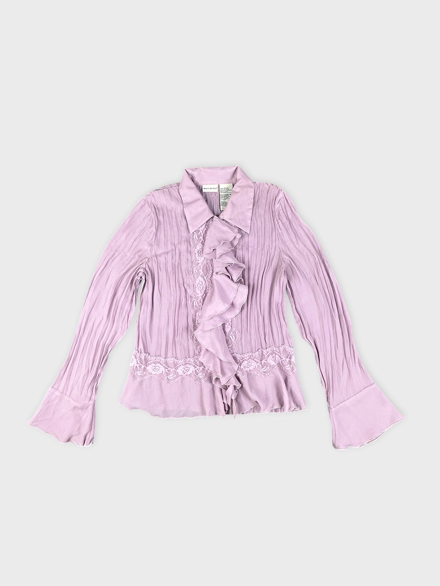 Front view of a pink button-up shirt with ruffled detailing.