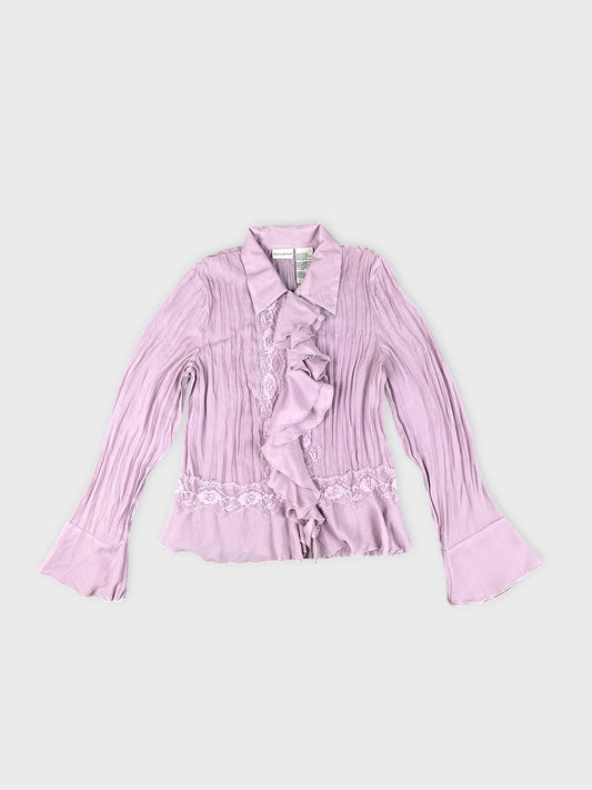 Front view of a pink button-up shirt with ruffled detailing.