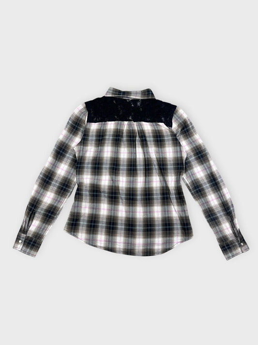 Back view of plaid button-up shirt with black lace panels.