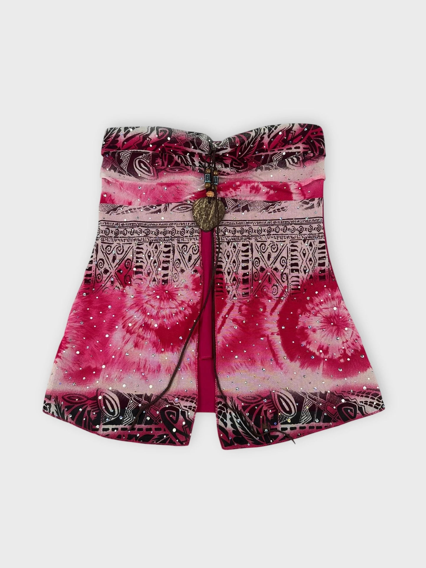 Psychedelic strapless top in pink with intricate patterns front view.