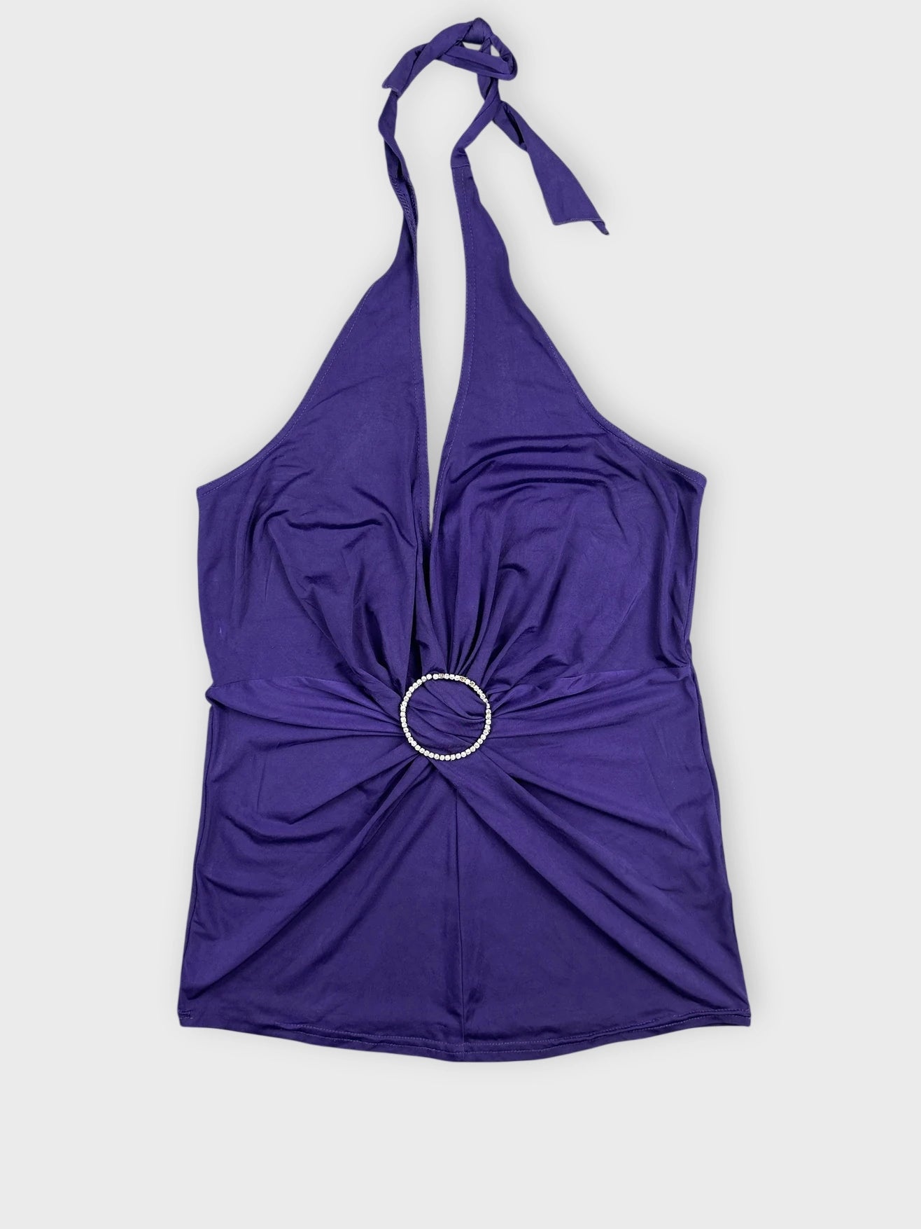 Front view of a purple halter top featuring a ring detail.