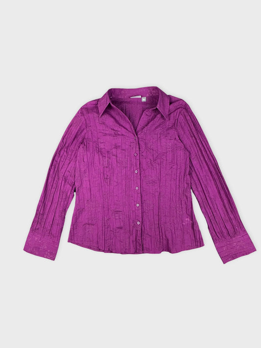 Front view of a purple striped shirt with a textured pattern.