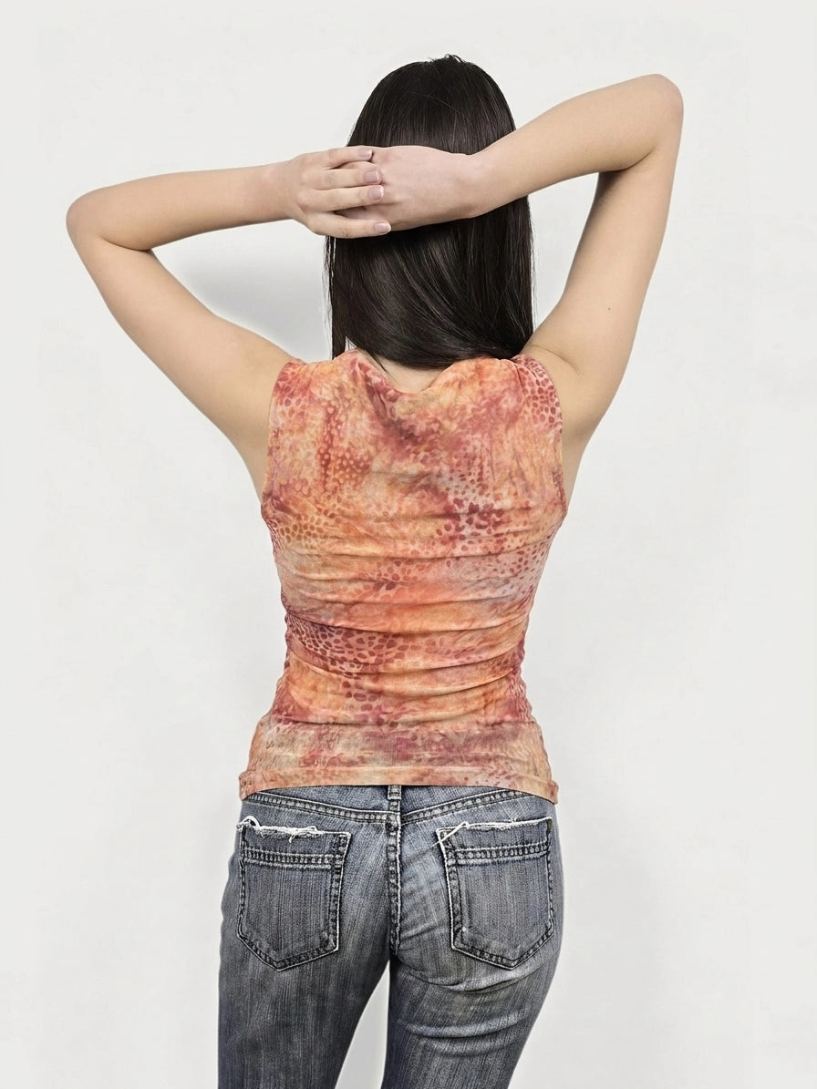 Back view of rust tie-dye ruched top showing textured pattern.