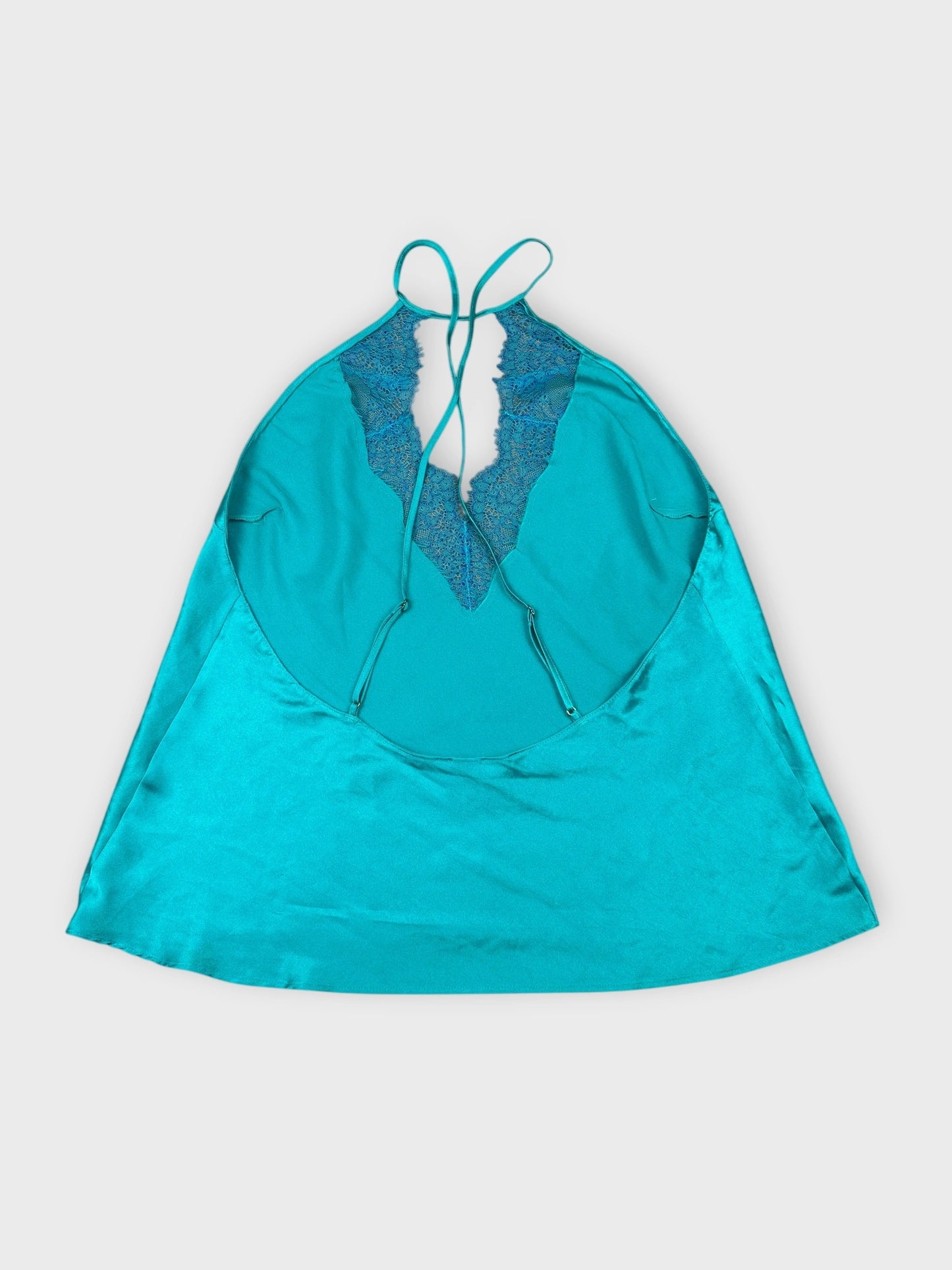 Silk halter top in aqua with lace trim back view.