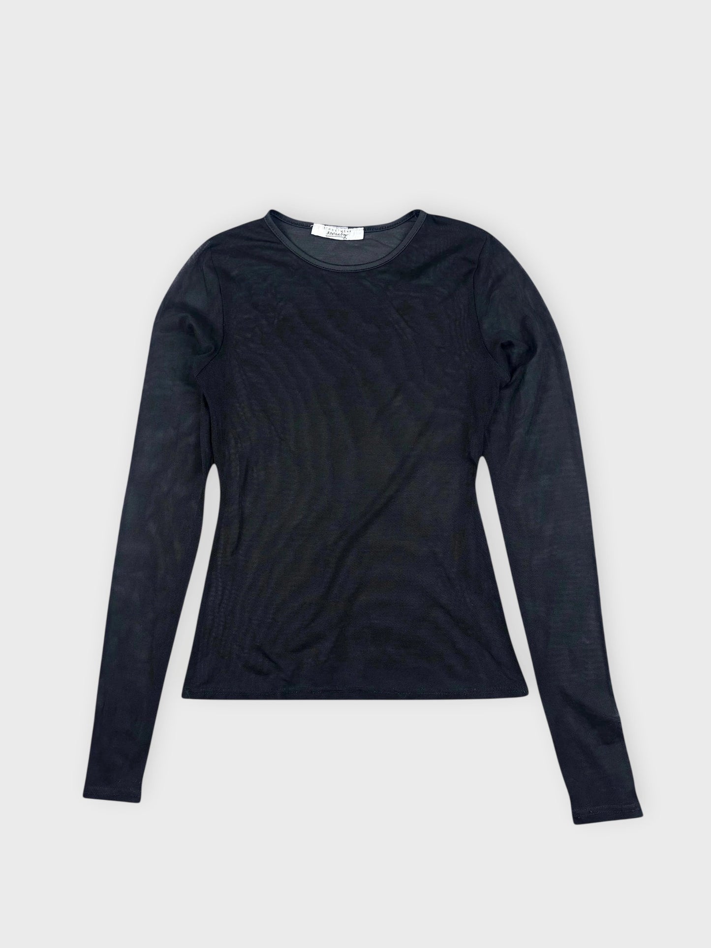Sleek sheer black long-sleeve top detail view highlighting its transparent texture.