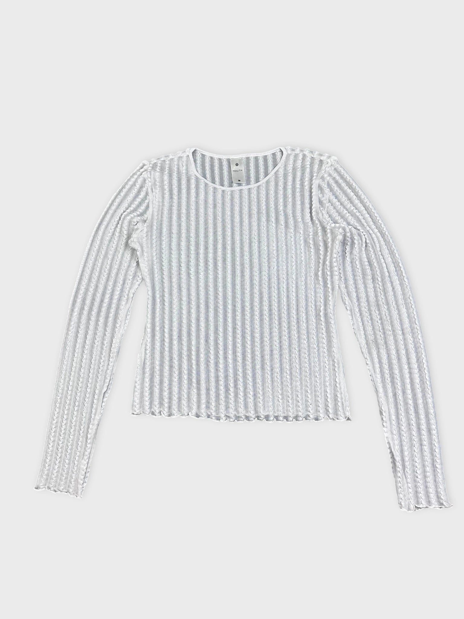 Front view of a white ribbed knit shirt with long sleeves.