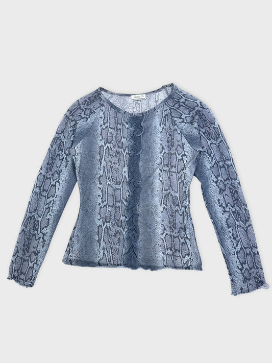 Front view of a long-sleeve snake print top in shades of blue.