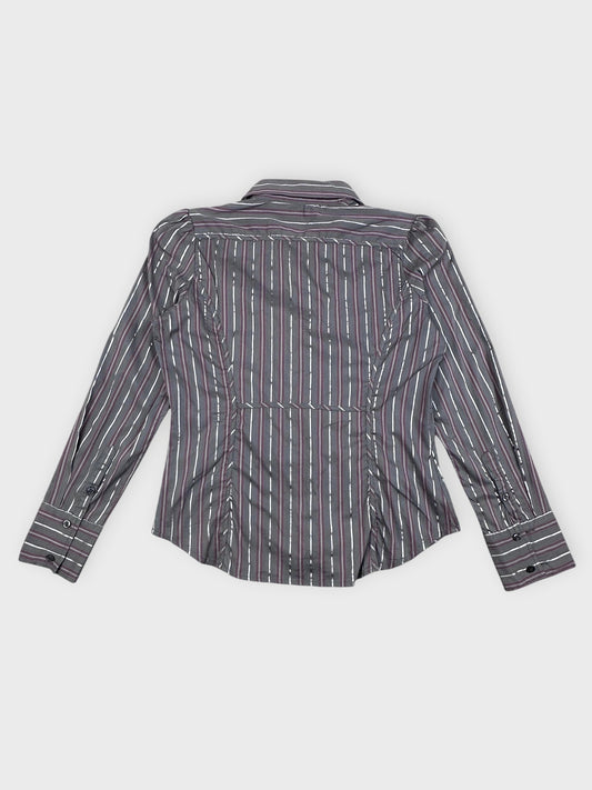 Back view of a striped long sleeve button-up shirt in black and gray.