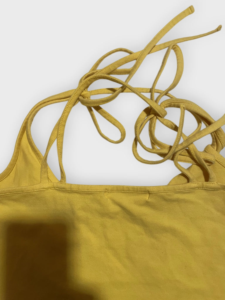 Back view of sunshine yellow tie-shoulder tank top with shoulder ties.