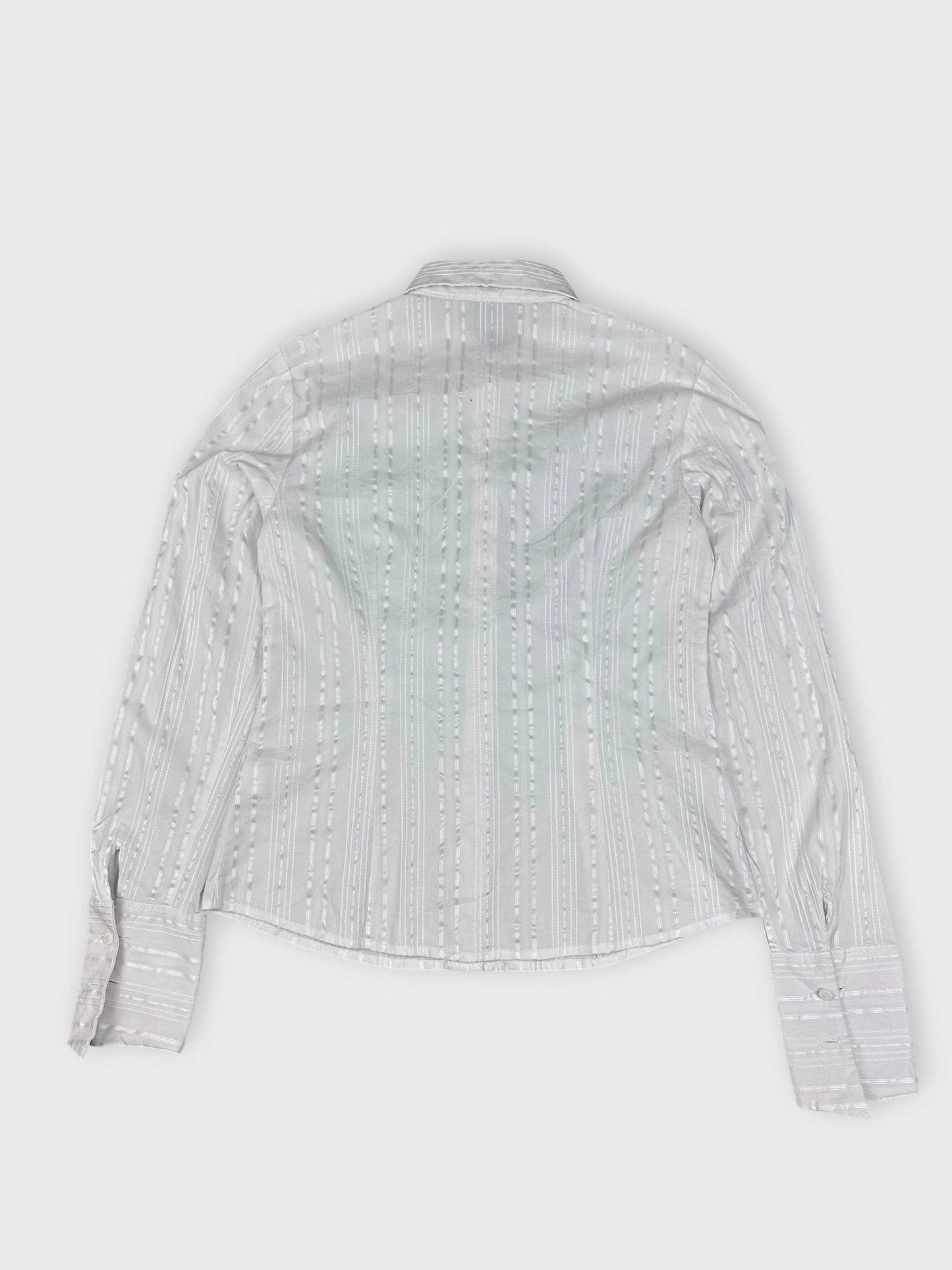 Back view of white textured button-up shirt featuring subtle stripes.