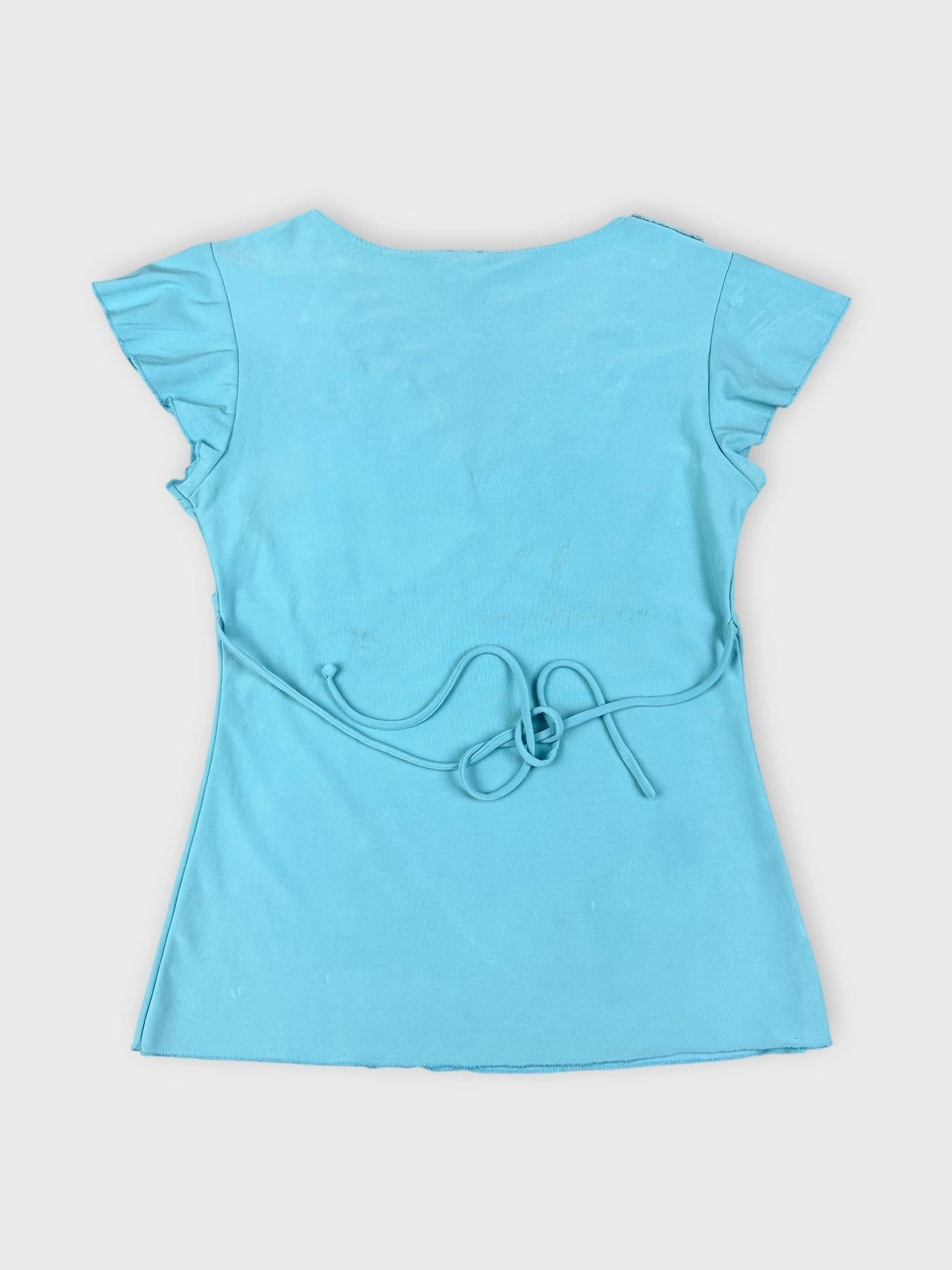 Turquoise short sleeve top with embroidered neckline back view