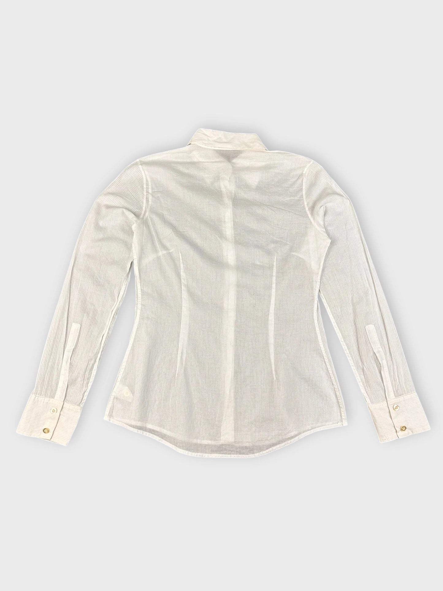 Front view of a white cotton button-up shirt featuring a classic collar.