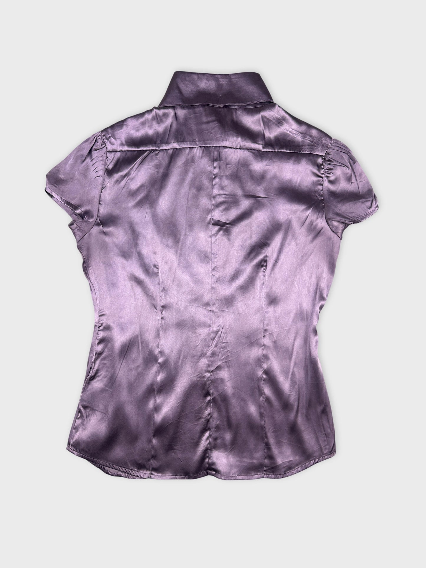 Back view of a purple body shirt with a collared neckline.