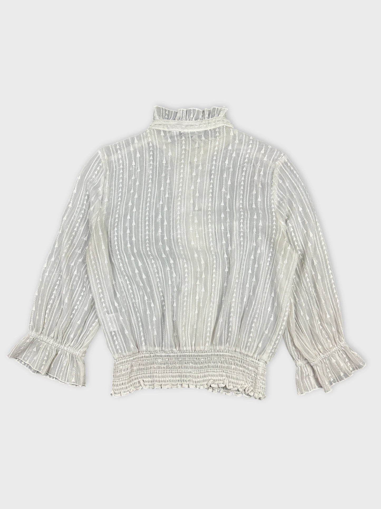 Back view of a white vintage body shirt with a ruffled collar and textured stripes.