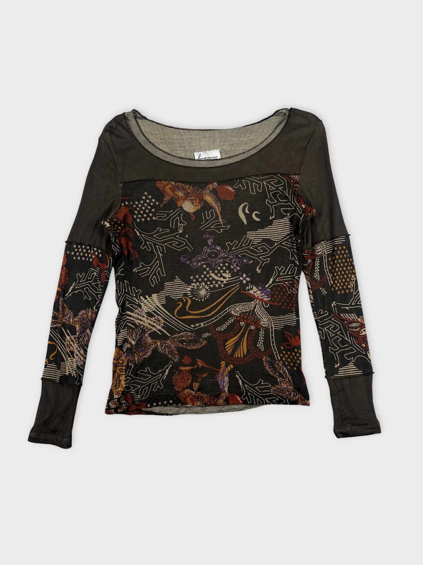 Detail view of a black long-sleeve body shirt with floral print.