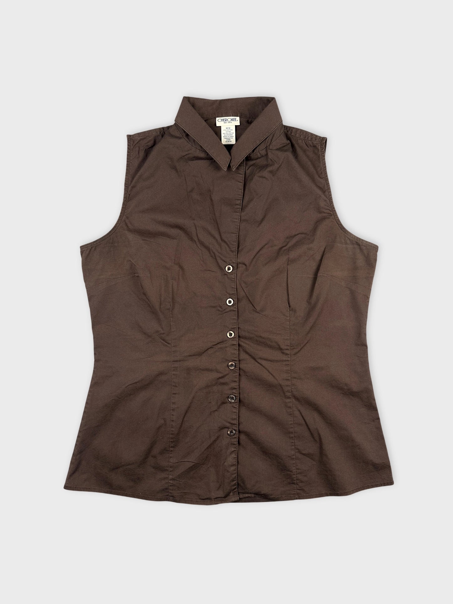 Front view of a brown sleeveless body shirt with button detail.