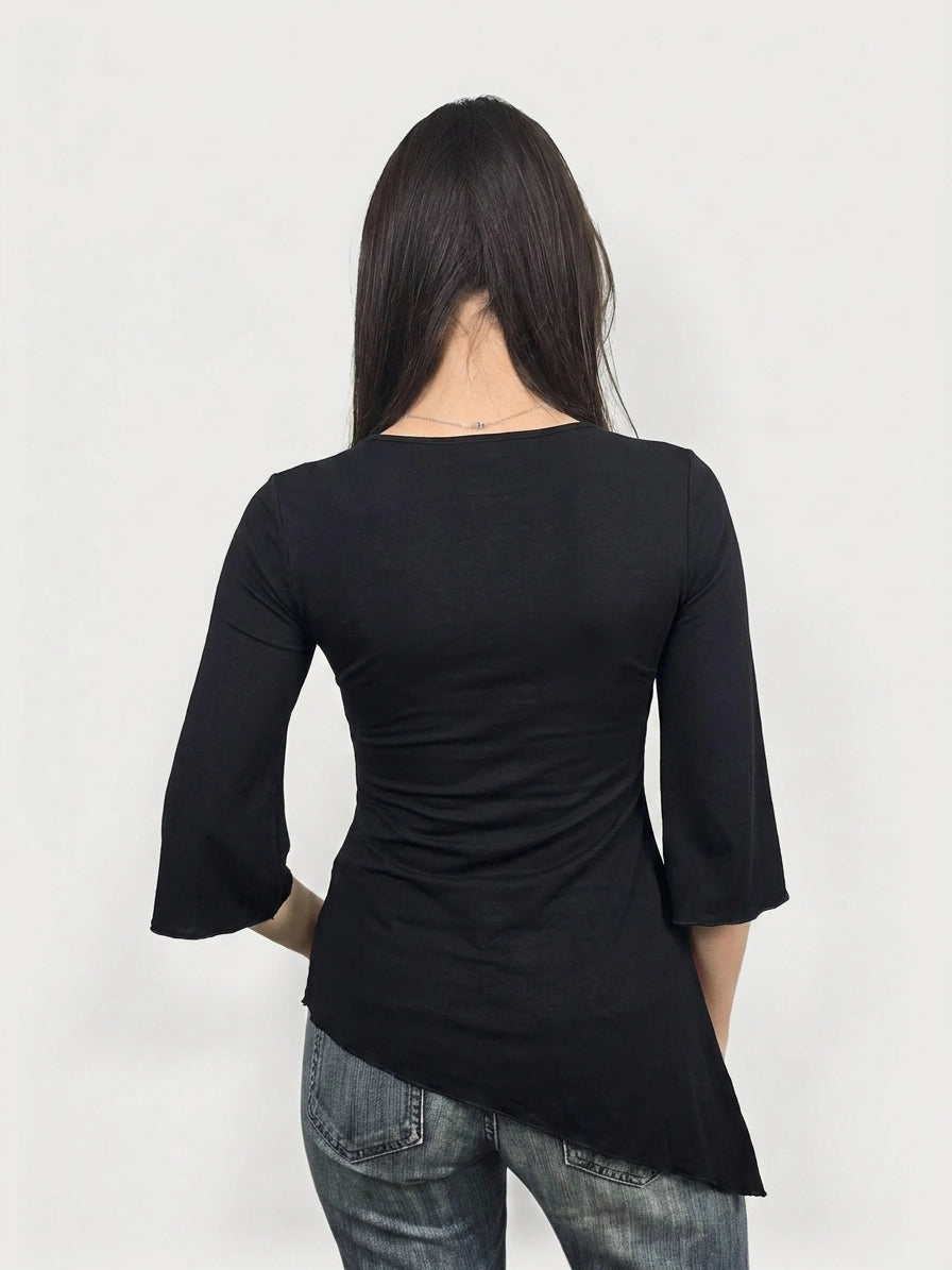 Back view of a black body shirt featuring a asymmetrical hem.