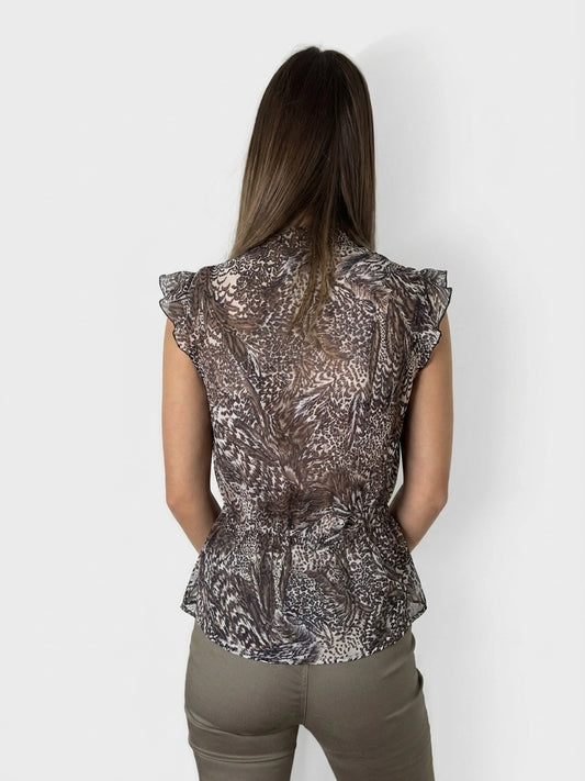 Back view of a women's body shirt in brown with ruffled sleeves and a patterned design.