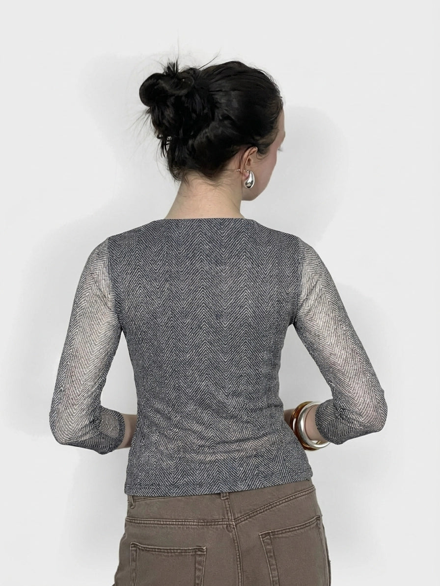 Back view of a women's body shirt in gray with herringbone pattern.