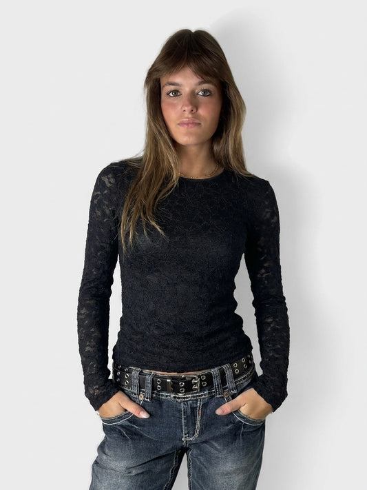 Front view of a black lace body shirt with long sleeves.