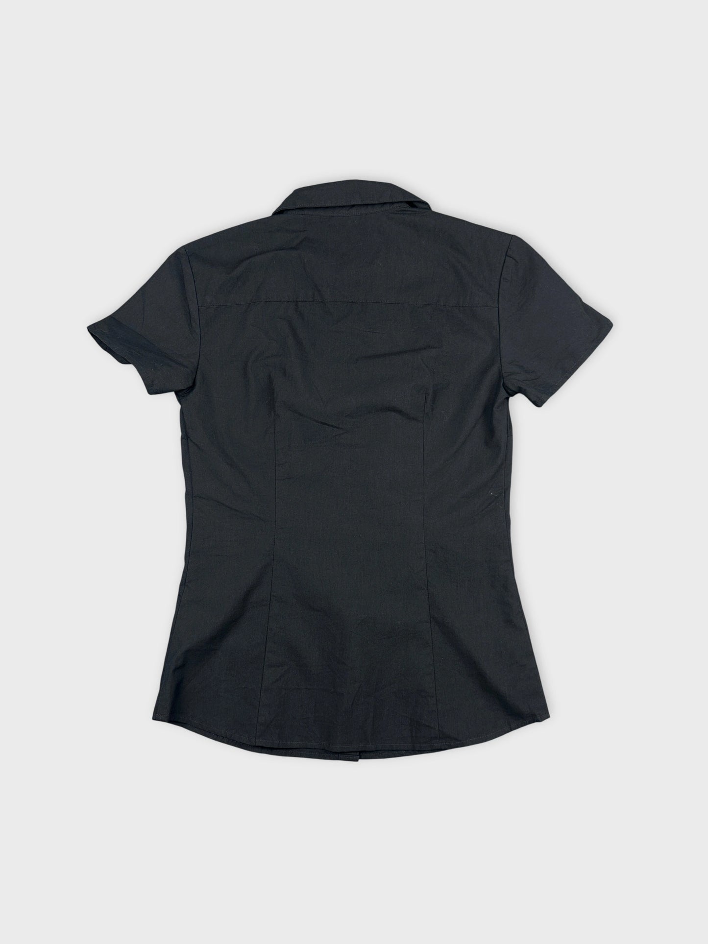 Back view of a black women's body shirt with a collar.