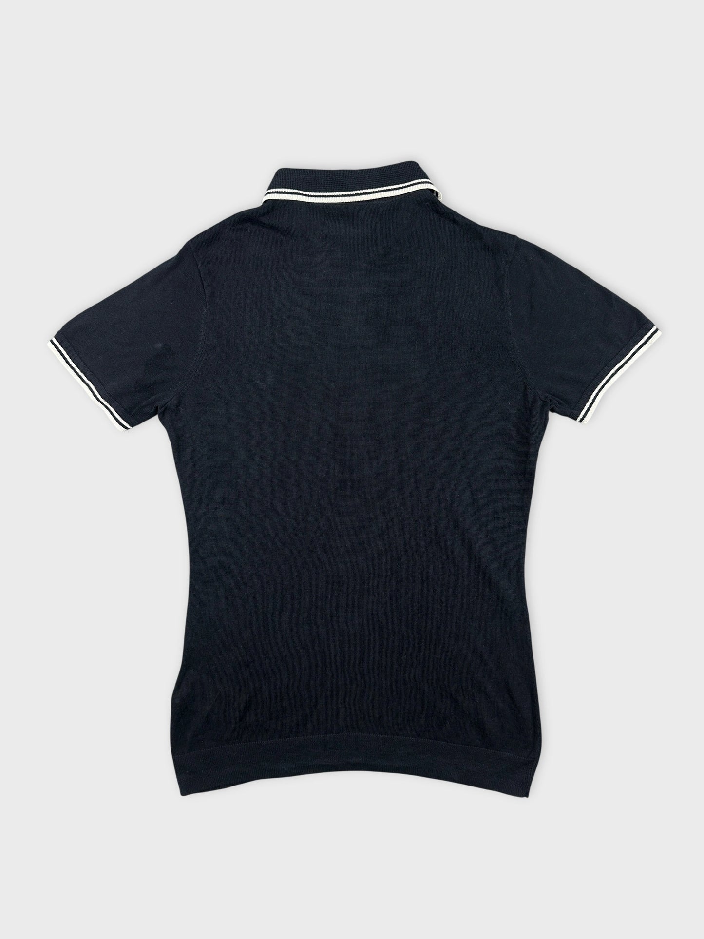 Back view of a black body shirt featuring a contrasting white collar