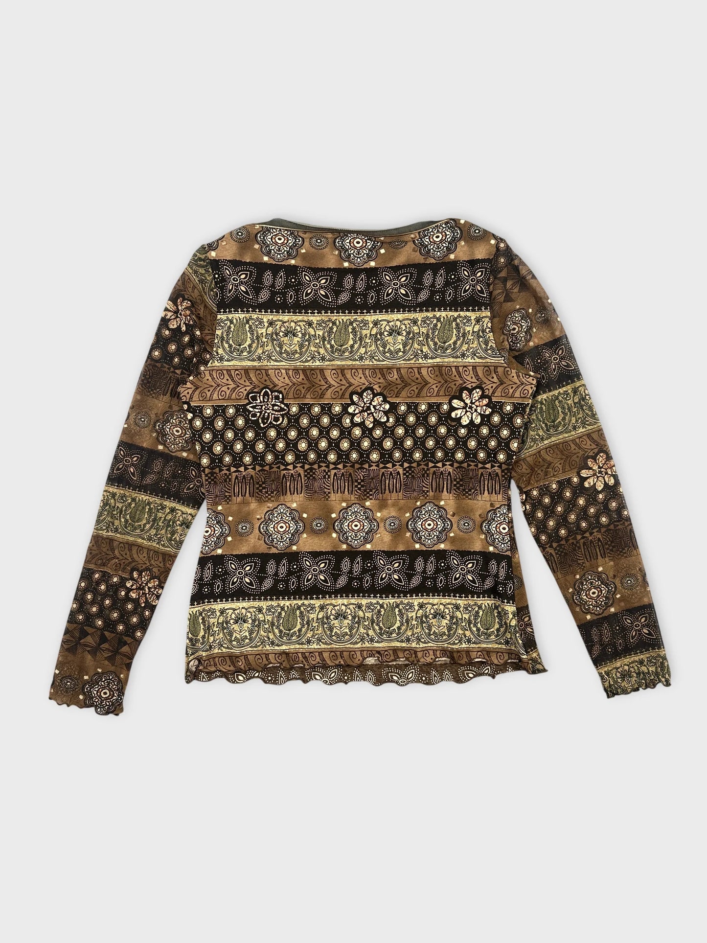 Back view of a brown patterned women's body shirt with floral designs.